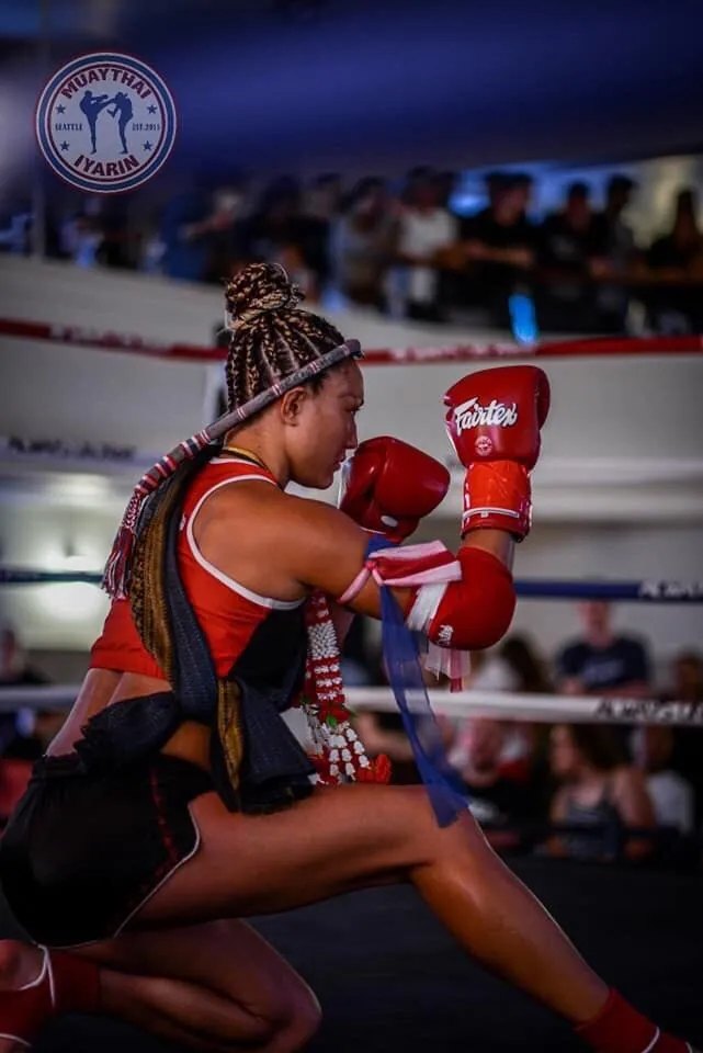Fighter kneeling in the ring